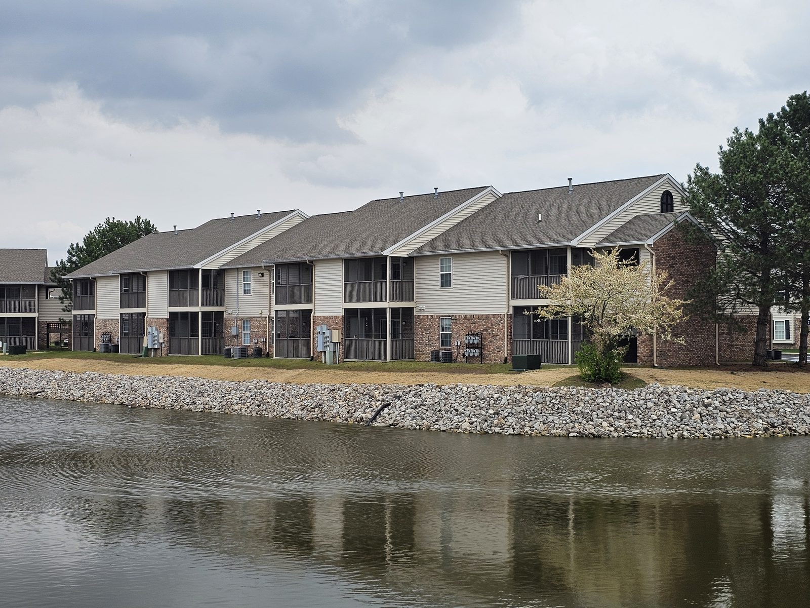 After: Completed riprap stone shoreline stabilization