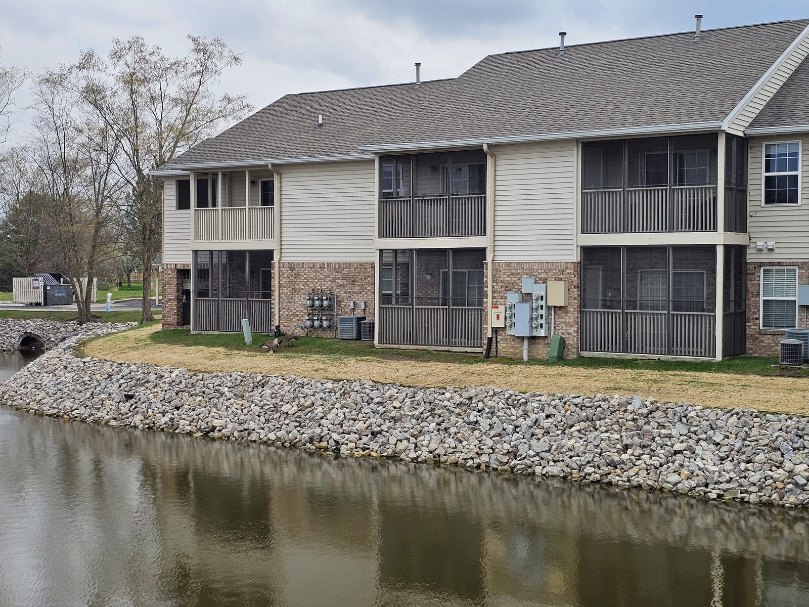 Completed riprap shoreline stabilization at Bexley Pond