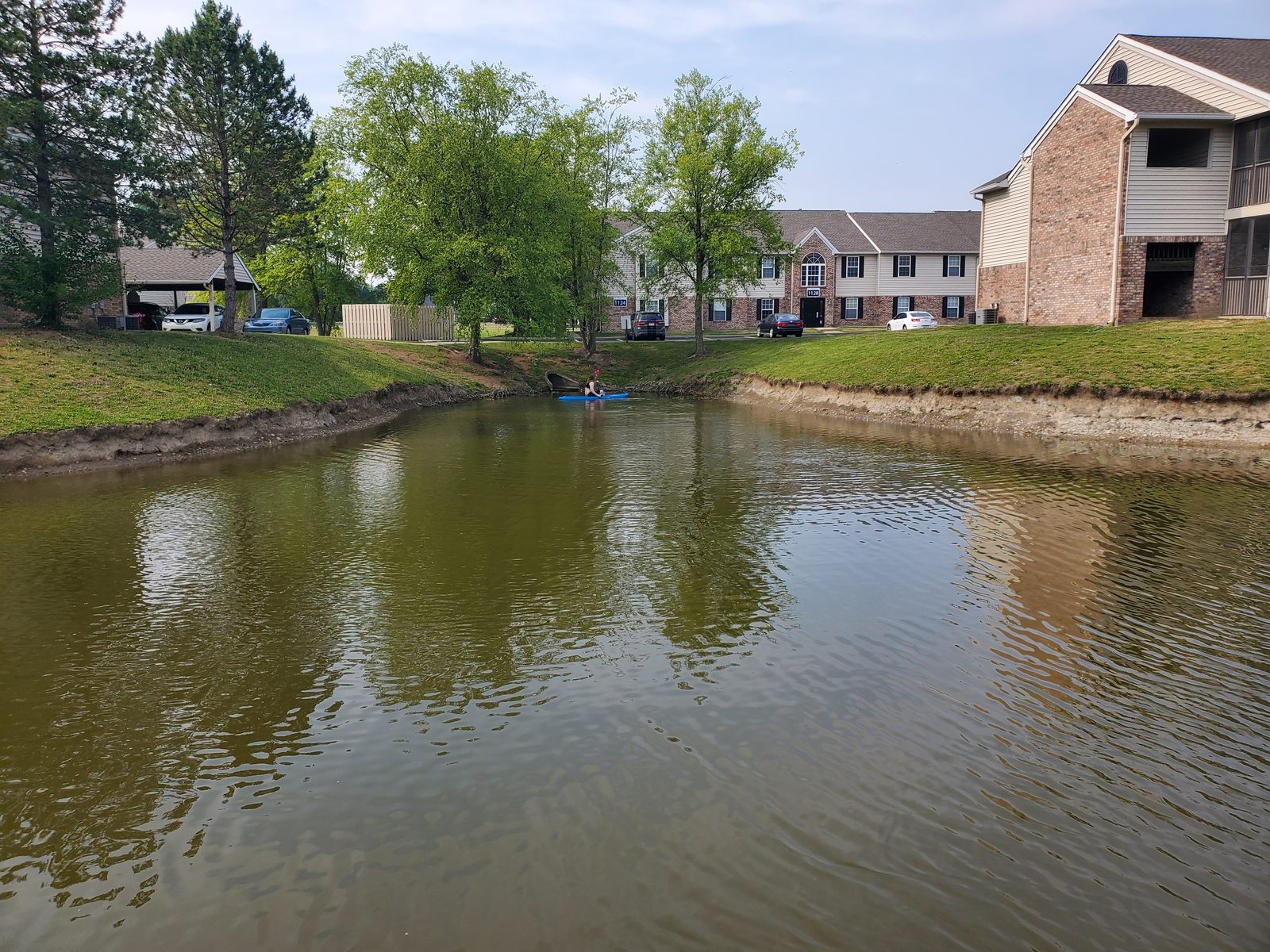Before: Unstable pond bank with erosion