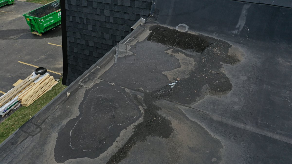 Drone view of roofline and exterior